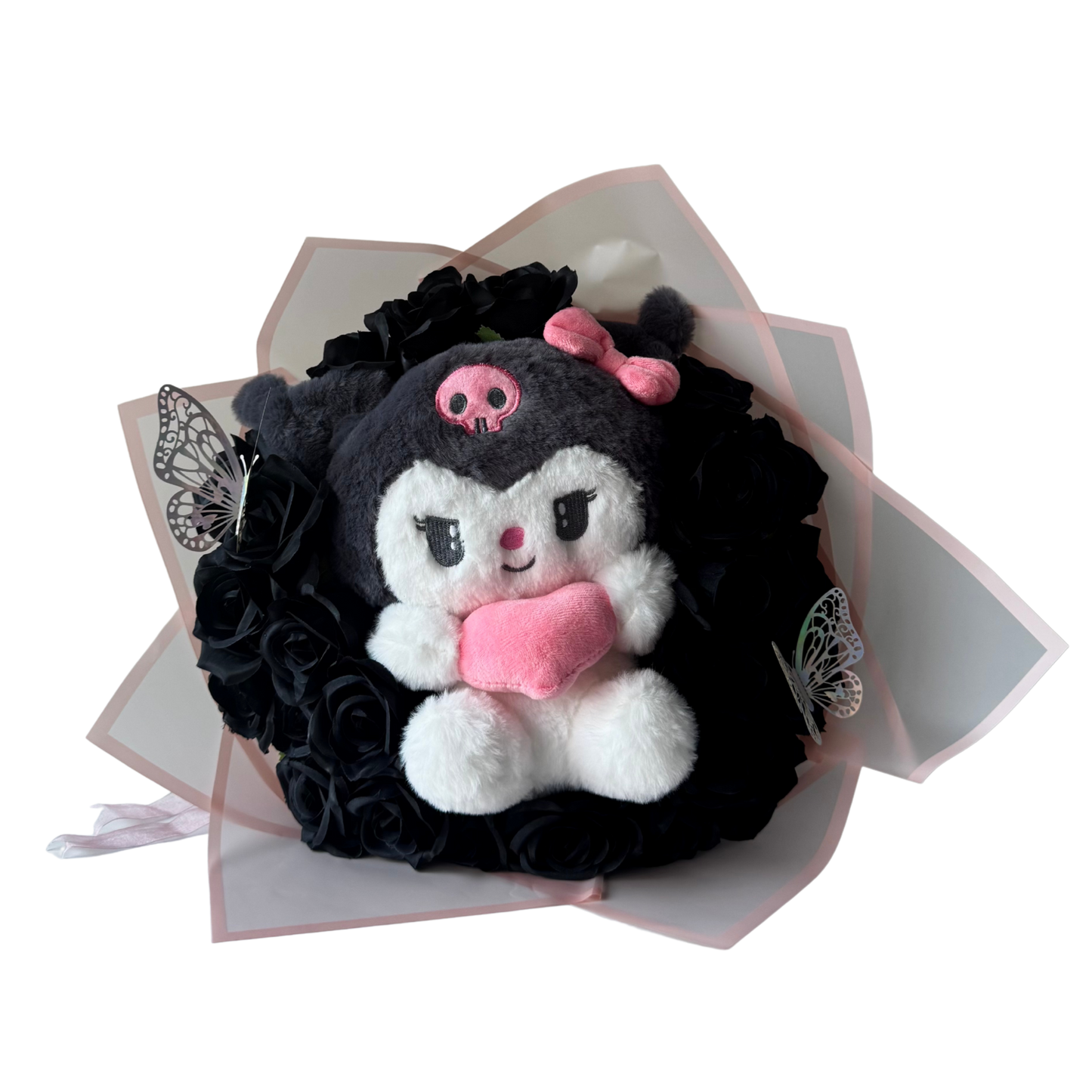 Plush toy with skull design on a decorative black and white background