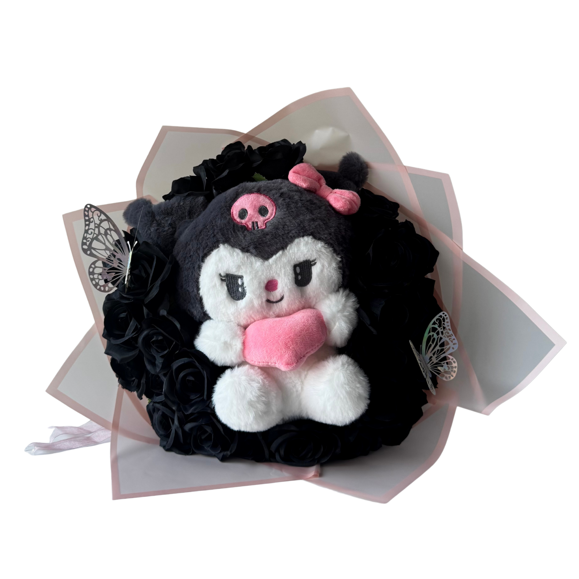 Plush toy with skull design on a decorative black and white background