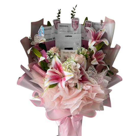 Bouquet of flowers with beauty products wrapped in it on a white background